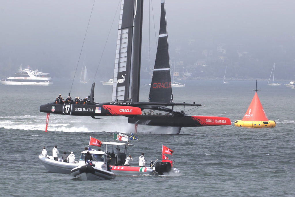 Luna Rossa support boat watches Oracle in the finals.  - America’s Cup © Chuck Lantz http://www.ChuckLantz.com